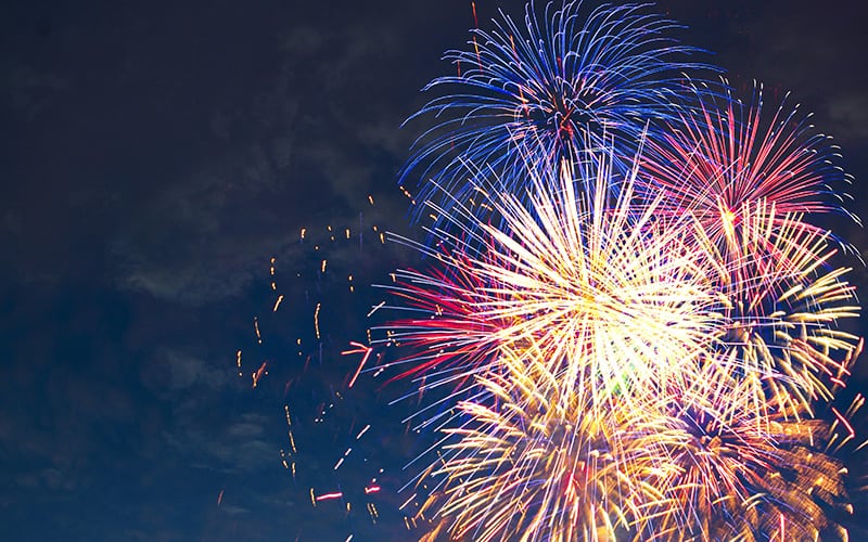Beautiful colorful fireworks on sky. International Fireworks. Fireworks display on dark sky background. Independence Day, 4th of July, Fourth of July or New Year.